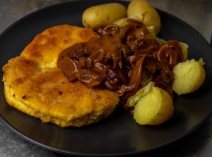 Pilzschnitzel in würziger Panade