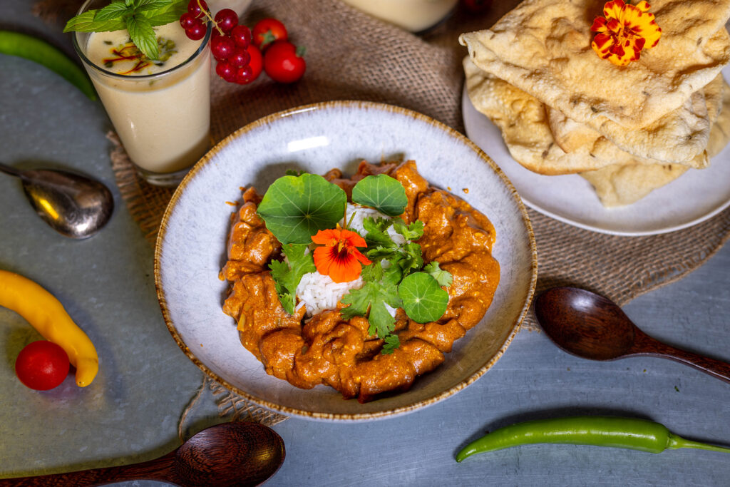 Murgh Makhani, Butter Chicken: cremig, würzig, zart mit einer leicht feurigen und einer fruchtigen Note.